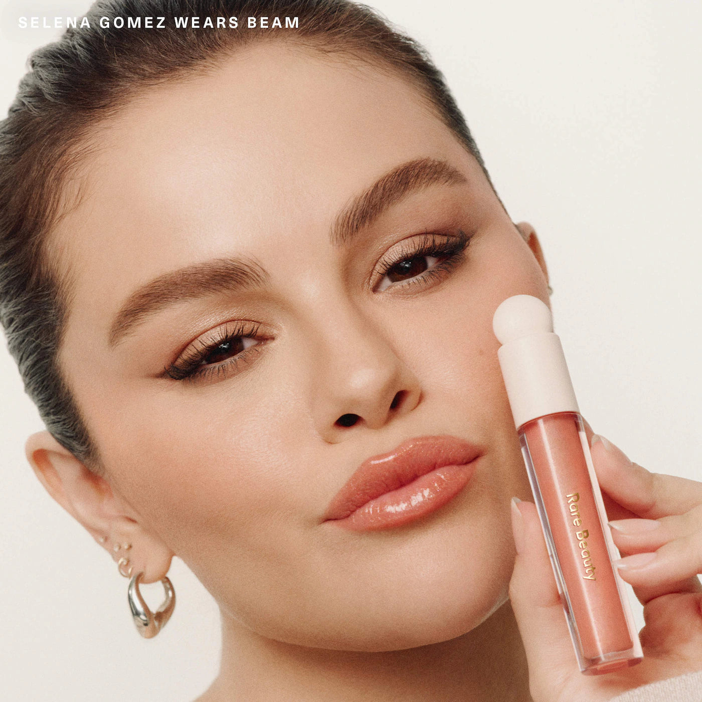 *PREORDEN: Positive Light Luminizing Lip Gloss - Rare Beauty / Labial cremoso con brillo