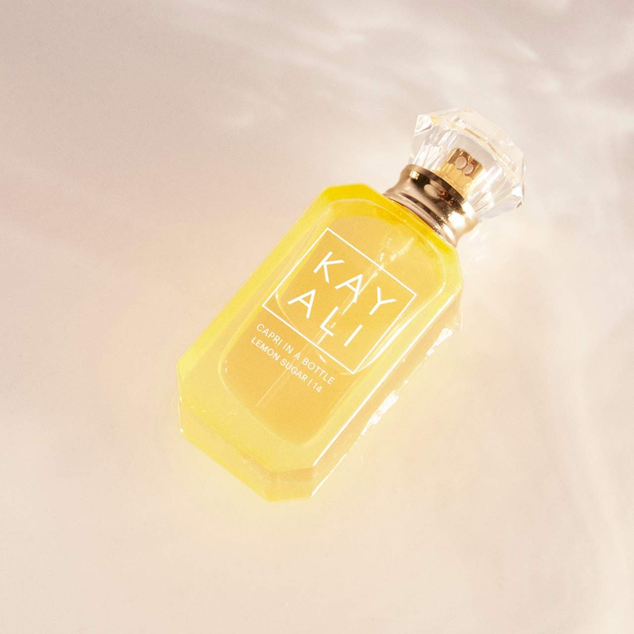*PREORDEN: Mini CAPRI IN A BOTTLE LEMON SUGAR | 14 Eau de Parfum  - Kayali / Perfume cálido